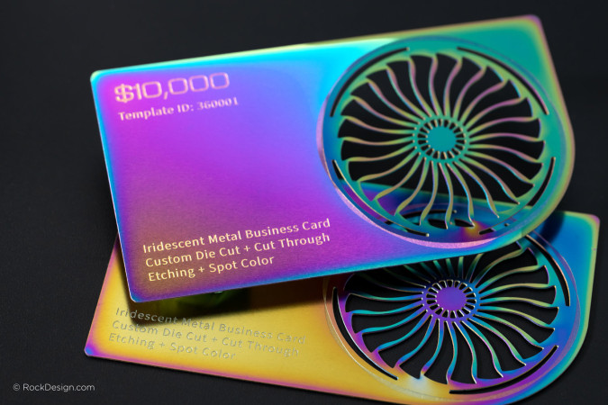 Custom iridescent metal business card with die-cut turbine design, cut-through etching, and vibrant rainbow finish for premium branding.
