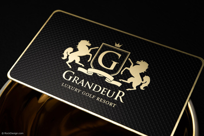 Black hard suede business card with bold white UV print and minimalistic design