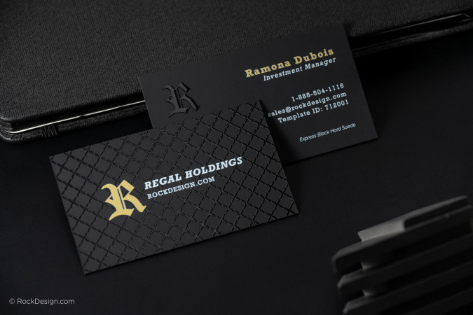 Two premium black business cards for "Regal Holdings" displayed on a dark surface. 