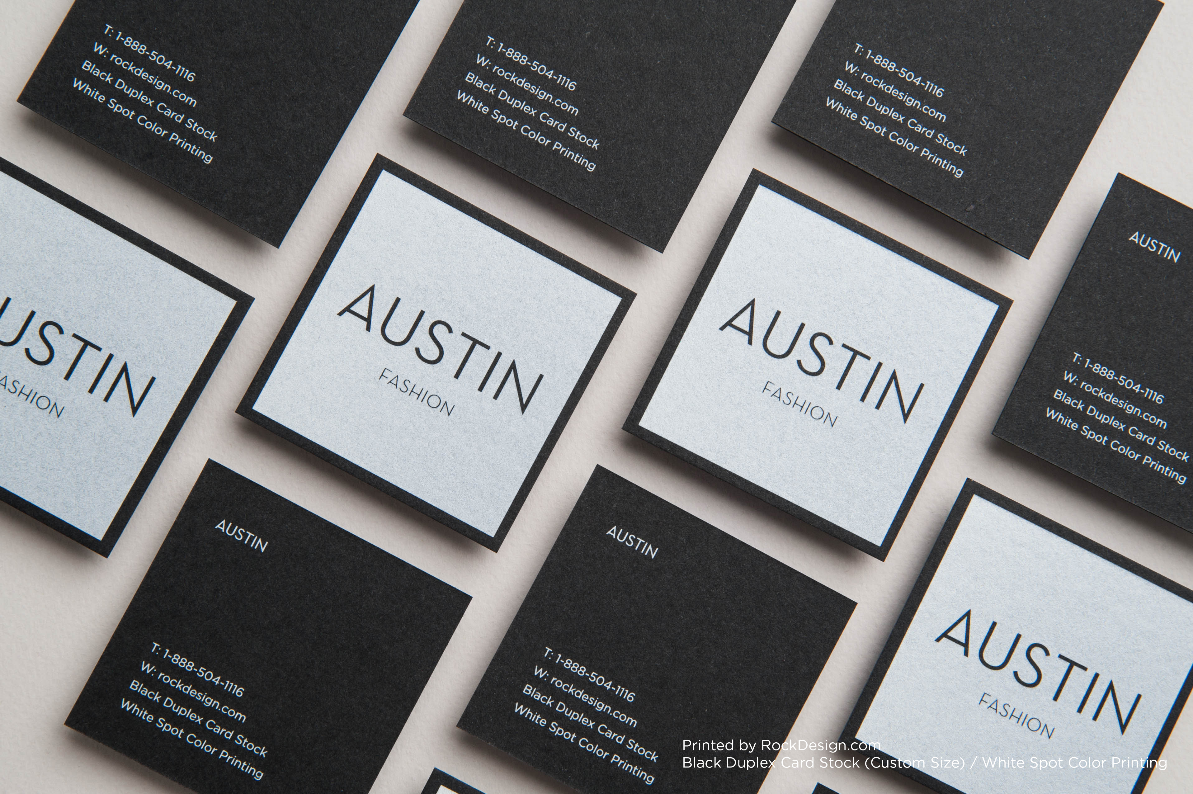 Black Duplex business cards with white spot color printing featuring a minimalist Austin Fashion design and custom contact details.