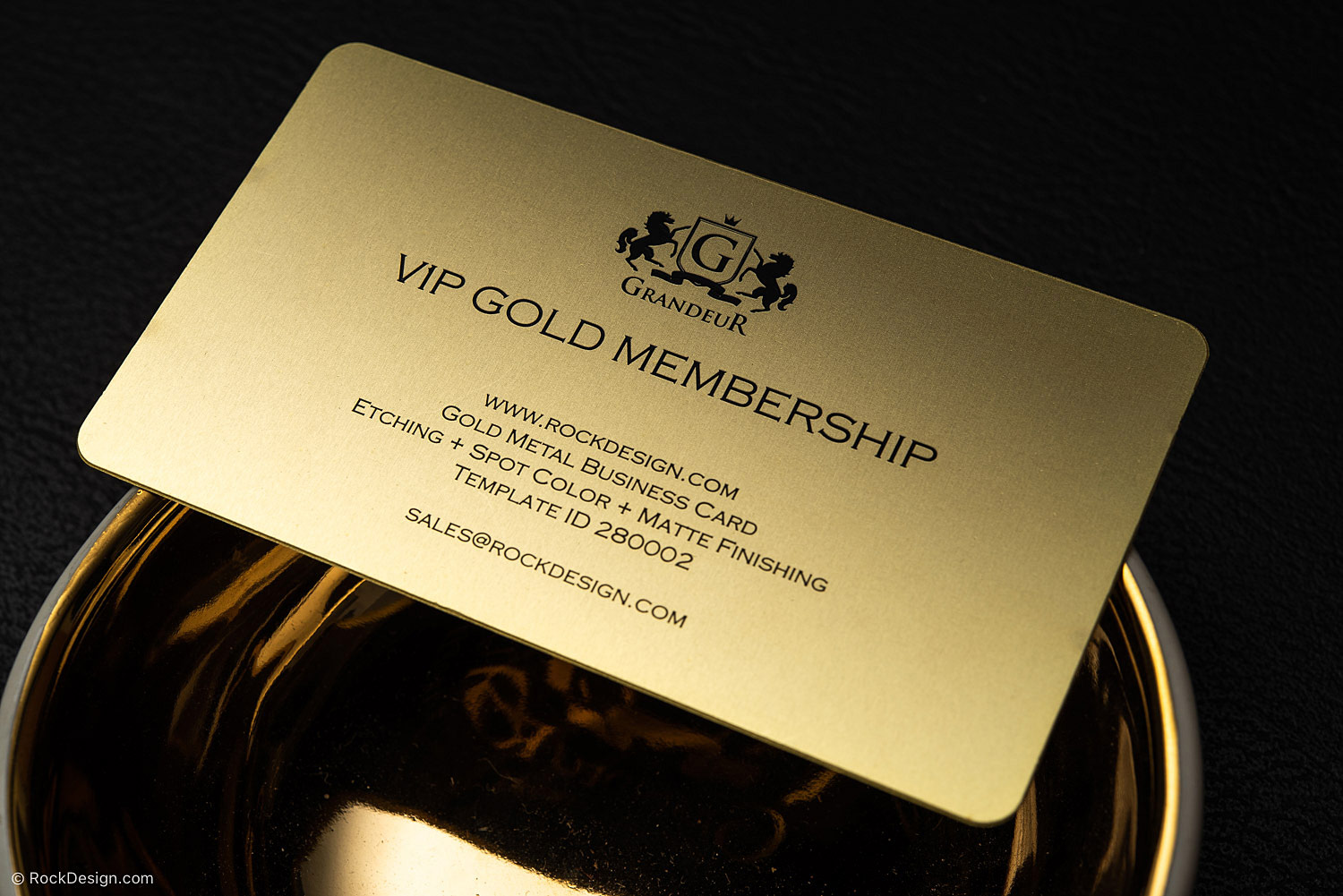 Professional black suede business card featuring white UV print for modern branding
