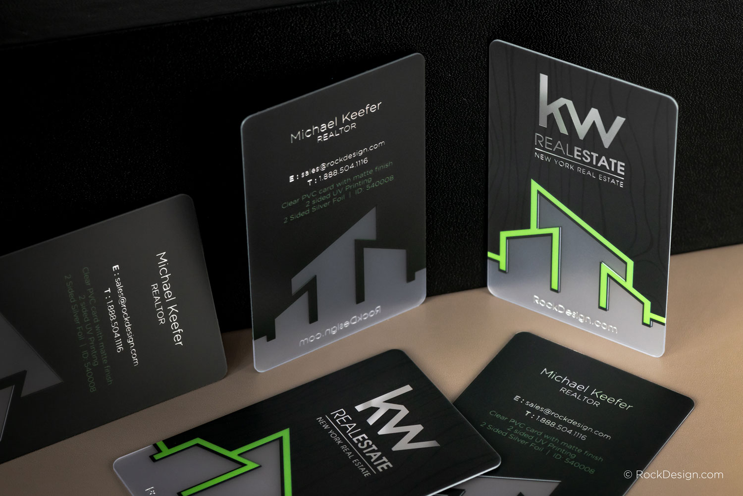 Professional clear PVC business cards with silver foil and matte finish for KW Real Estate, featuring modern architectural line design and UV printing – RockDesign