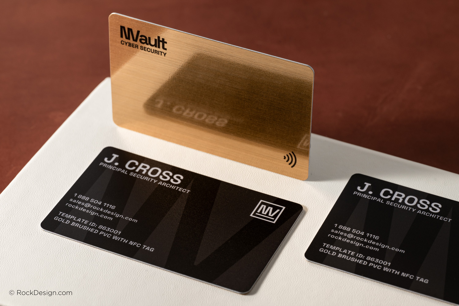 Custom gold brushed PVC business card template featuring black UV printing and embedded NFC tag technology.