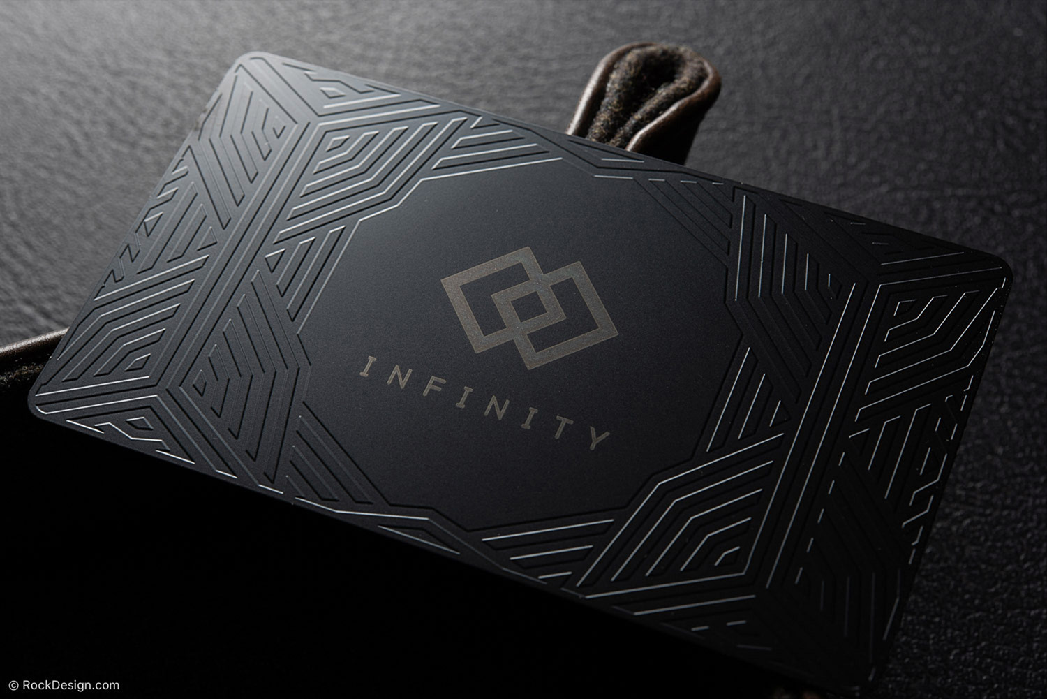 laser-engraving-patterned-black-metal-business-cards-modern-luxury-bold-artistic-aesthetic-rockdesign-image-01